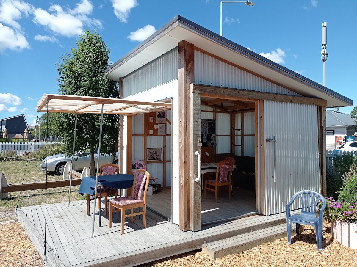 Sunny outdoor seating deck at the stand